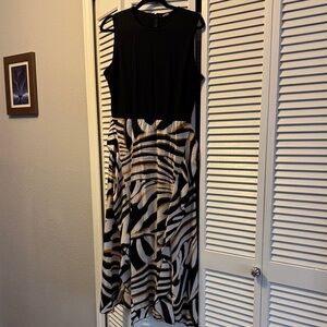 Sleeveless Black Bodice Maxi Dress with Black, White & Gold Patterned Skirt